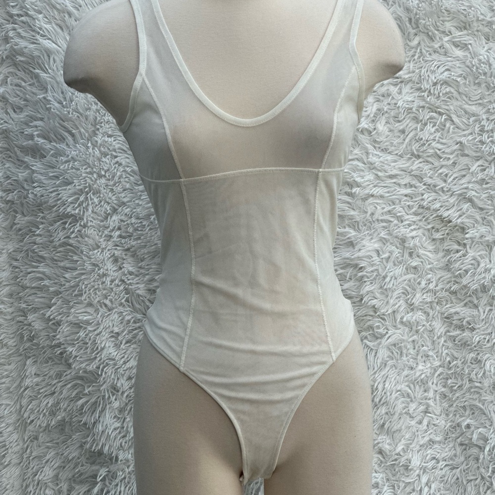 New Forever 21 Elegant Sheer White Bodysuit in size small